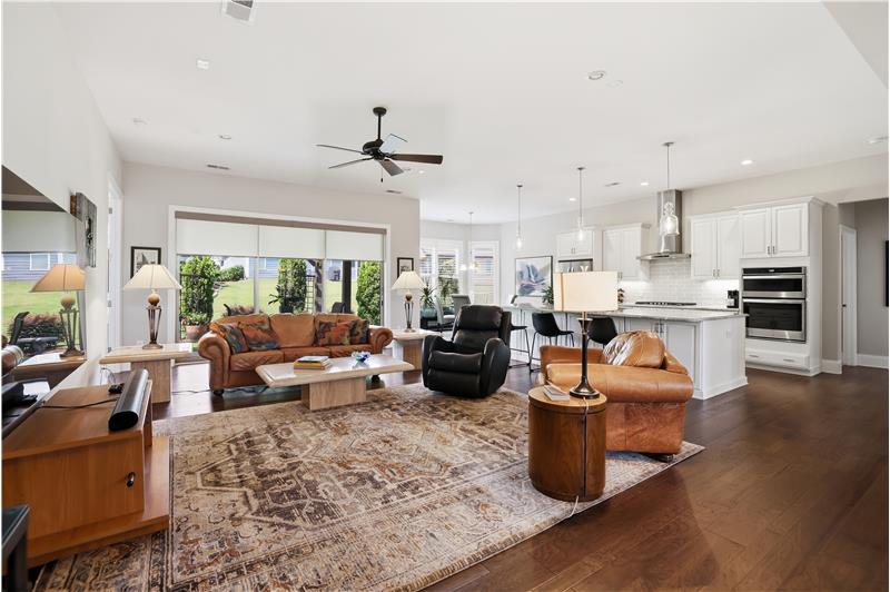 Spacious great room with 10 foot ceilings, hardwood floors, and open layout ideal for everyday living and entertaining.