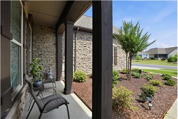 Porch offers an ideal spot to relax with morning coffee, greet guests, or enjoy quiet evenings outdoors.