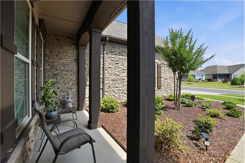 Porch offers an ideal spot to relax with morning coffee, greet guests, or enjoy quiet evenings outdoors.