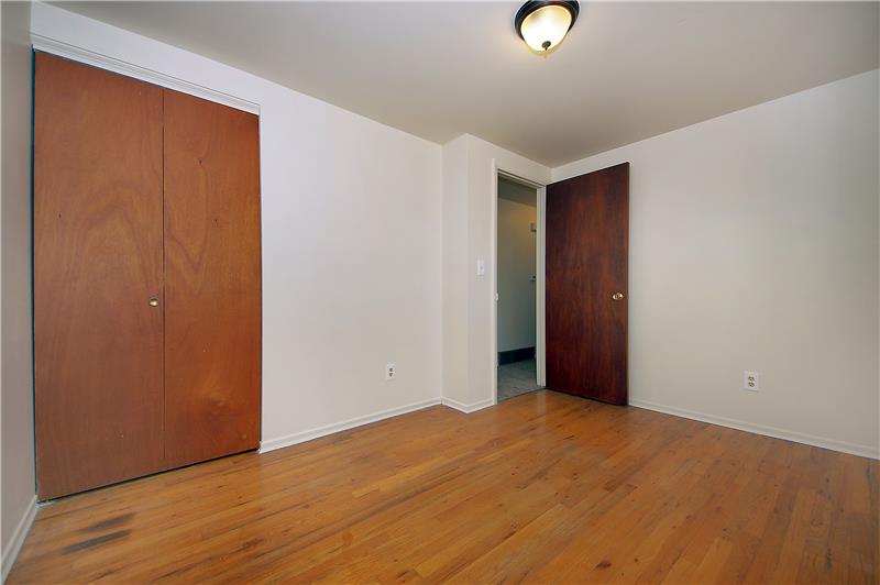 Bedroom 3 with hardwood floors