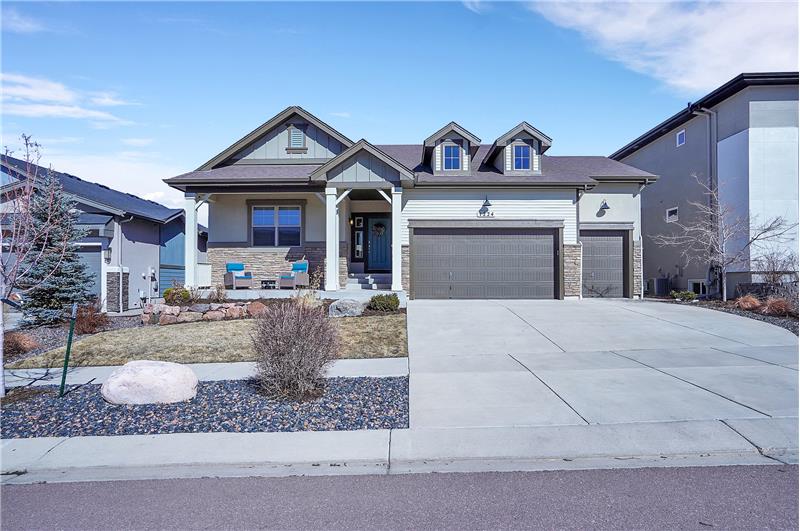 South-facing 4 BR, 3 BA, ranch-style stucco home located in The Farm community!