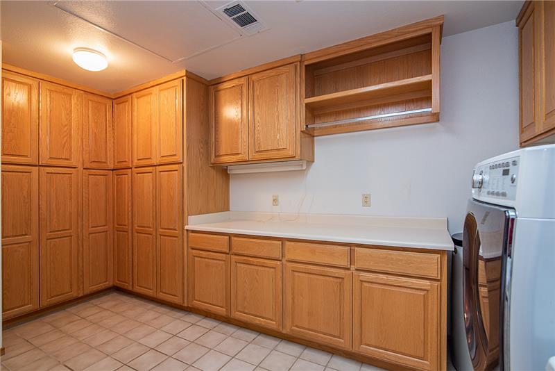 So much storage in the oversized laundry room!