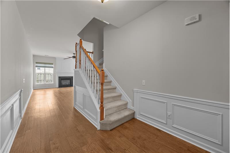 Foyer leads to an open concept living and dining.