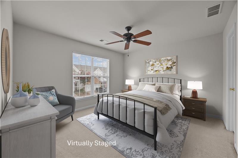 One of two additional bedrooms on the home's second floor.
