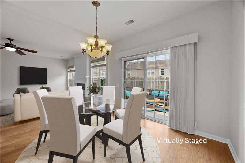 Townhome features a true dining room, allowing space for sit-down meals and gatherings separate from the kitchen and living room