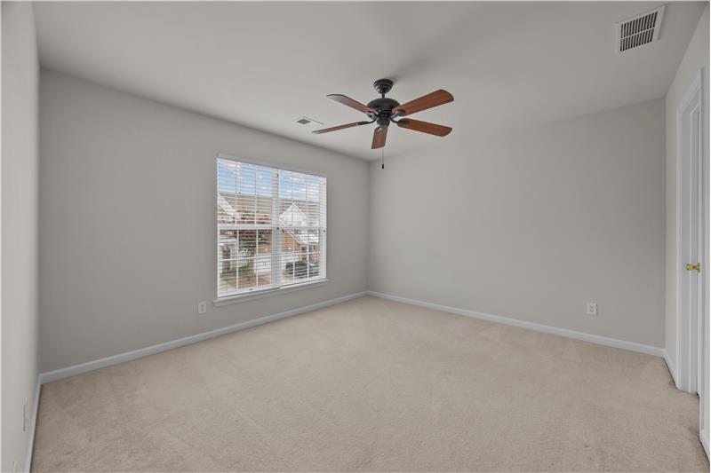 Neutral paint, neutral carpet are a blank canvas to decorate to suit your taste.