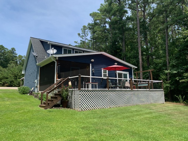 Lakeside with screened porch and large deck
