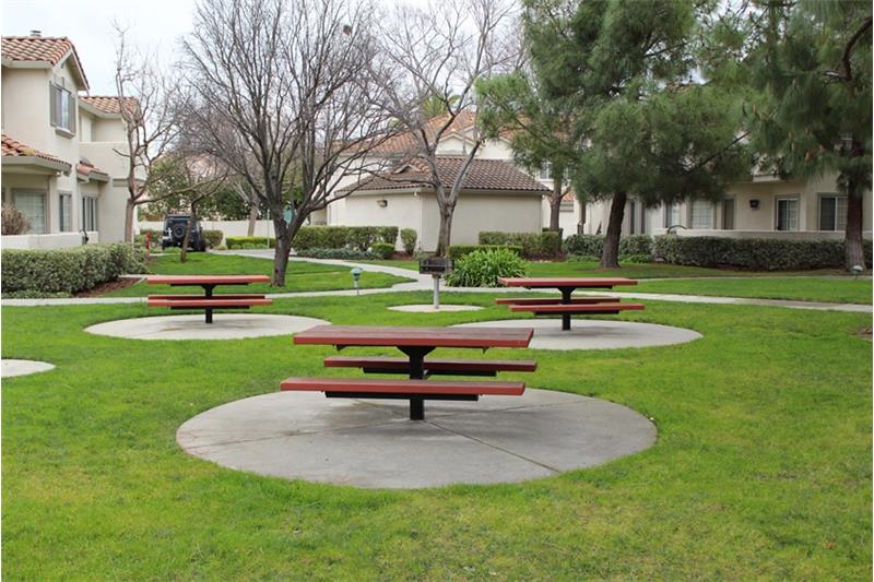 Community BBQ Area With Picnic Tables