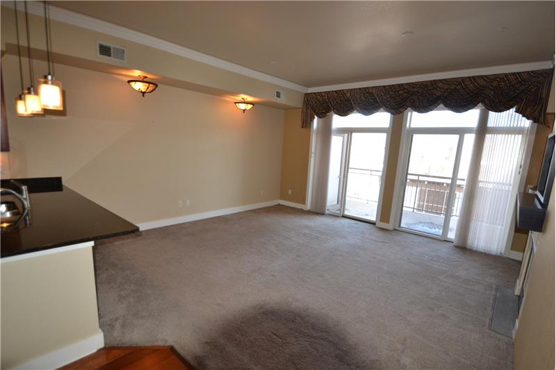 Living/dining room is open to kitchen and has a Murphy bed for guests!