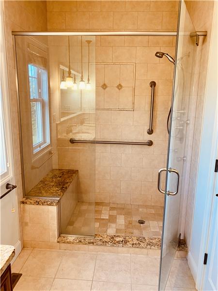 Tiled shower & granite