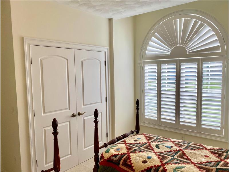 Plantation shutters on window