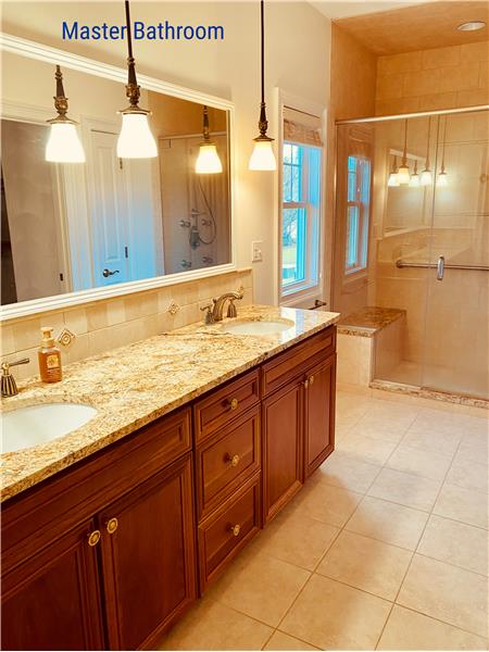 Master bath with 2 sinks & granite