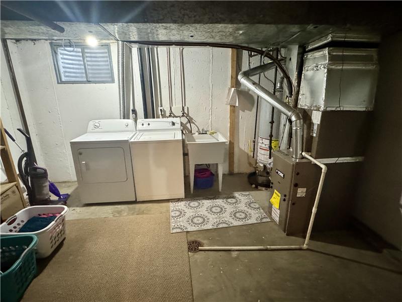 Included washer and dryer are in the basement utility room with newer HVAC and water heater