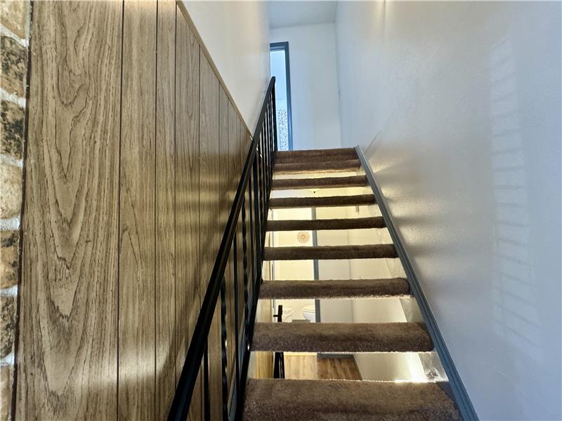 View to stairs to 2nd floor from front door