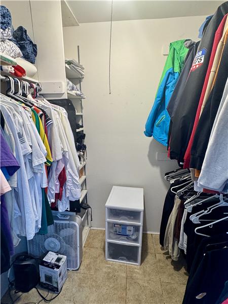 Large walk-in closet in primary bedroom