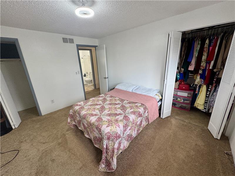 Guest bedroom has two closets
