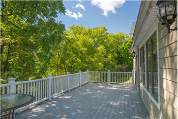 Expansive deck surrounded by trees