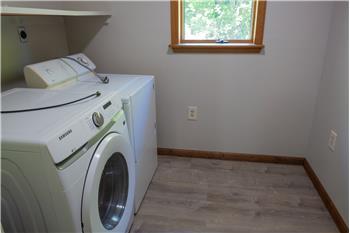 Laundry room  next to kitchen.   Also the location of the electrical box