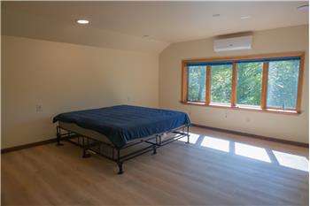Primary bedroom with four panel window