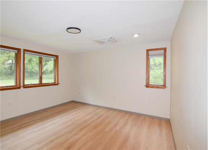 Bedroom 2  with large window facing the front yard