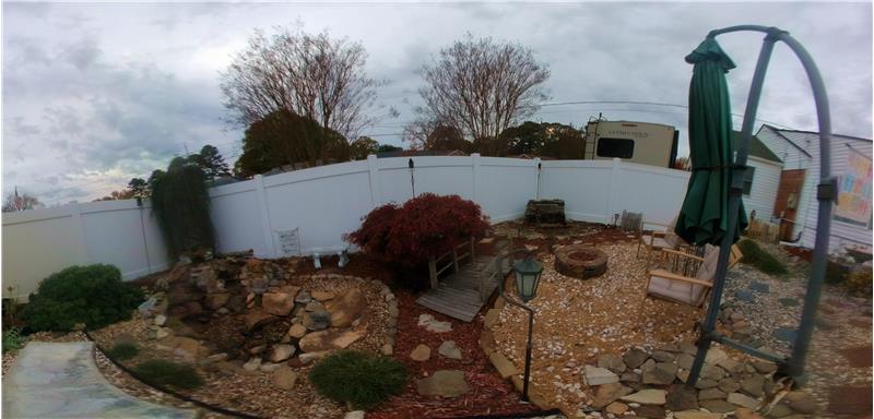 Two water features with lights and a fire feature