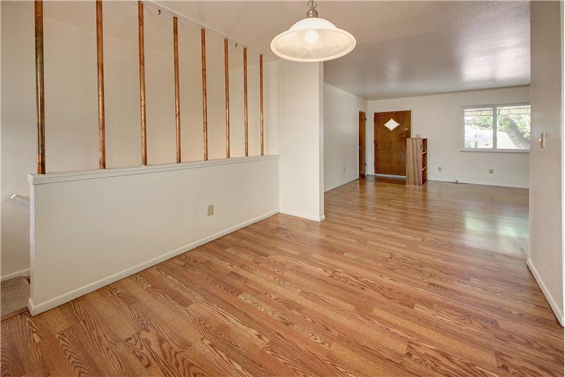 Dining area with hardwood flooring