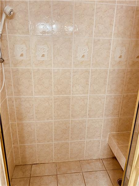 Tiled shower with seat