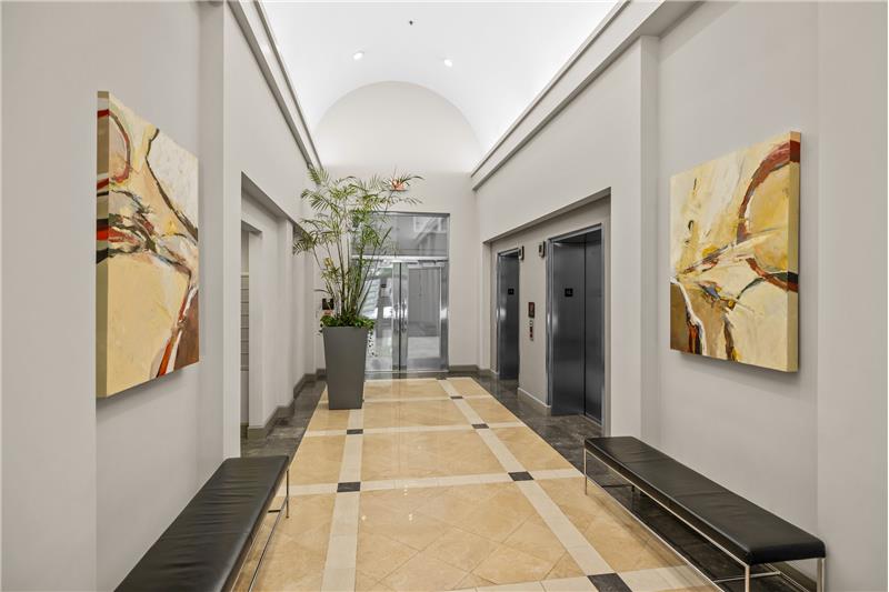 Stylish, immaculate lobby with two elevators. Secure access to building