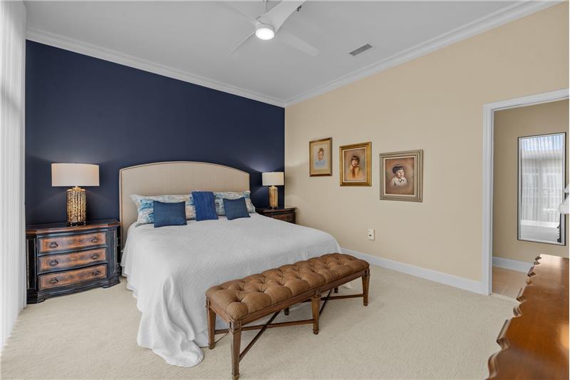 Owner's suite includes a large walk-in closet, en-suite bathroom, crown molding