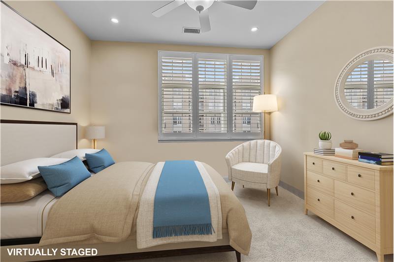 Second bedroom virtually staged to show as a bedroom