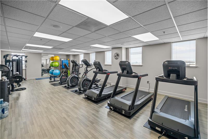 Ultimate convenience of a private, well-equipped fitness center, outfitted with a variety of exercise equipment