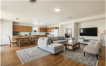 virtually staged combo family room and kitchen
