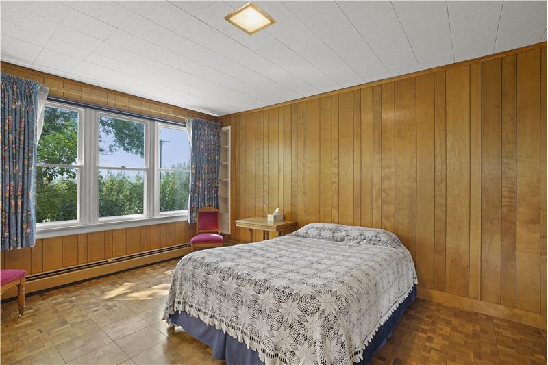 Birch paneling in every room (except walnut paneling in living room)