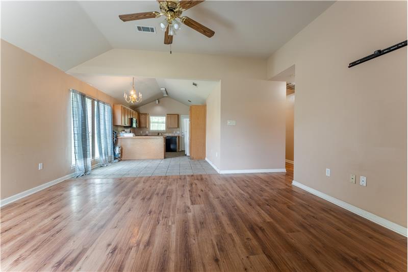 Living area with laminate wood flooring