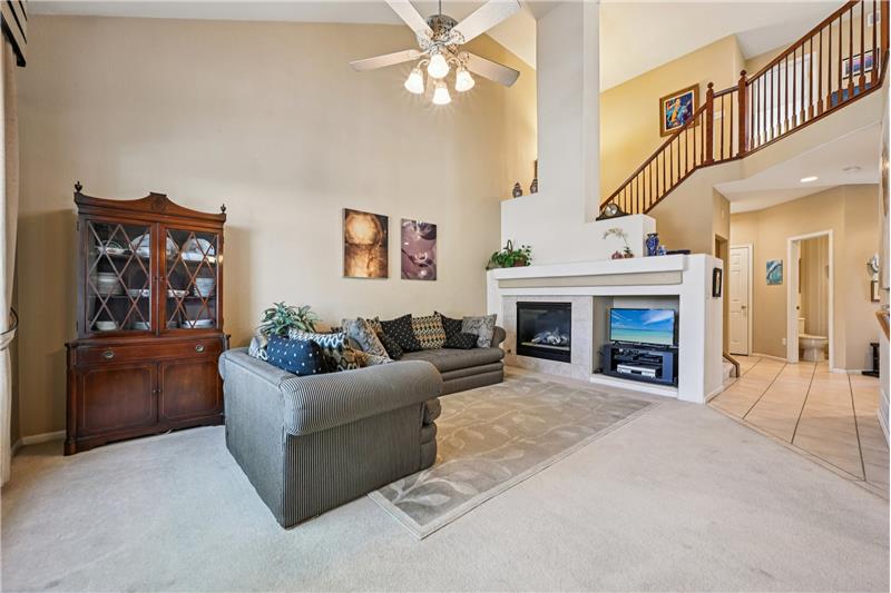 Living room with vaulted ceiling 