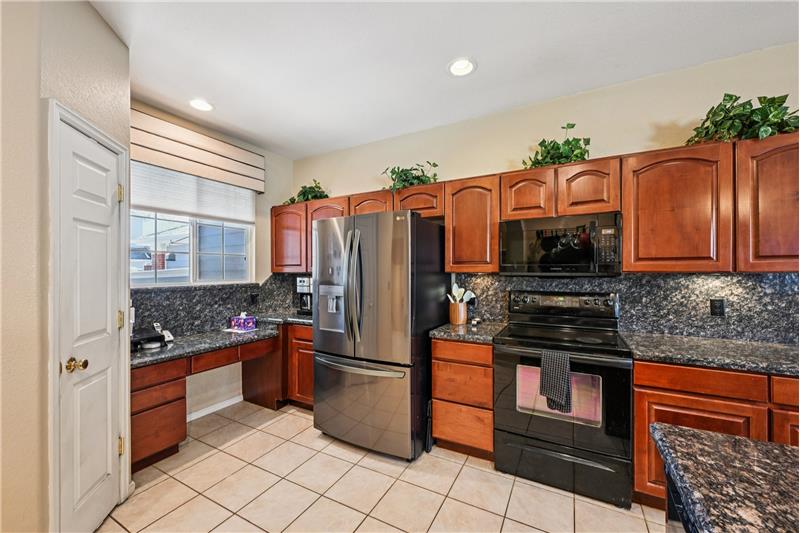 Note the cherry wood cabinets