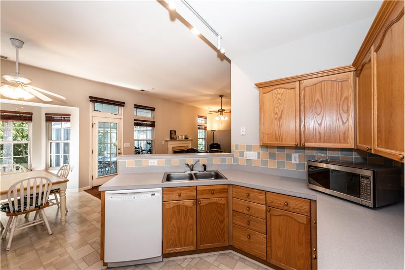 Sight lines to the breakfast area and great room from the kitchen.