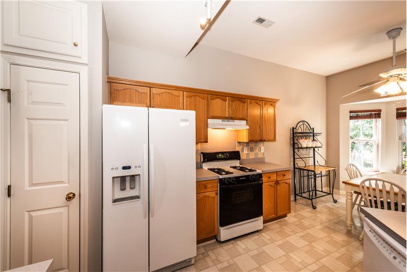 You'll enjoy the views to the wooded back yard from the kitchen.