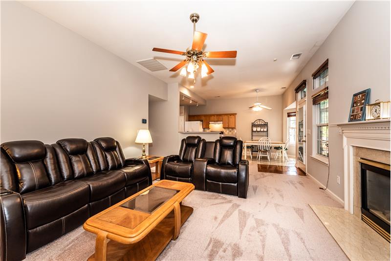 Open sight lines to the breakfast area and kitchen. Freshly painted; brand new carpet.