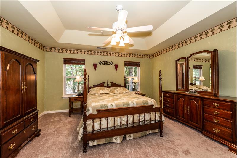 Owner's suite features a trey ceiling with fan/light, brand new neutral carpet.