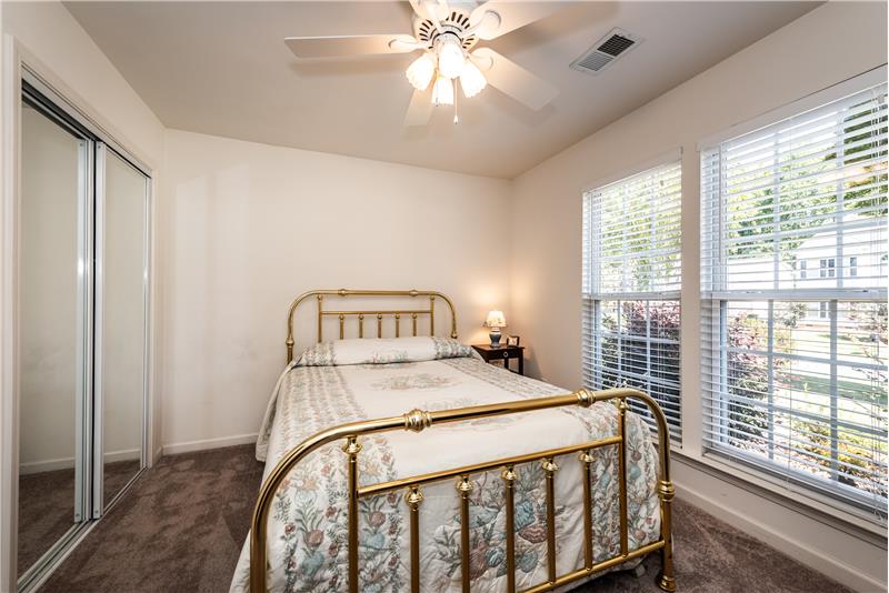 One of two secondary bedrooms on the main floor with brand new carpet.
