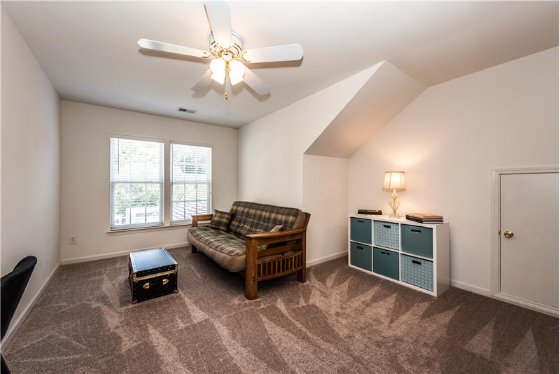 Second floor bonus/recreation room with brand new carpet can be adapted for numerous uses.