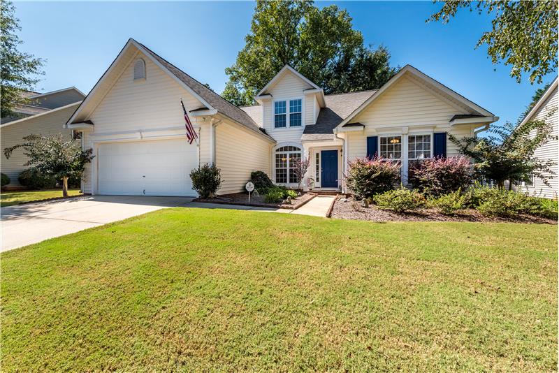 2-car garage provides ample parking and/or storage space. More parking in the driveway.