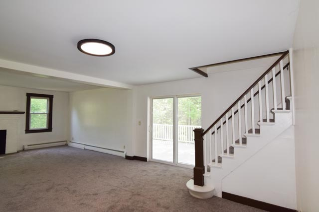 Staircase from living room to second floor