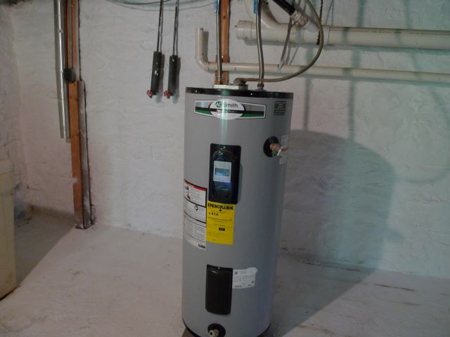 New water heater and area for washer/dryer hookup