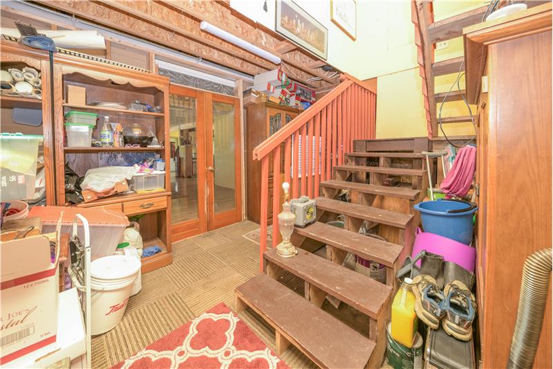 Back of barn/dwelling. Stairs lead to loft.