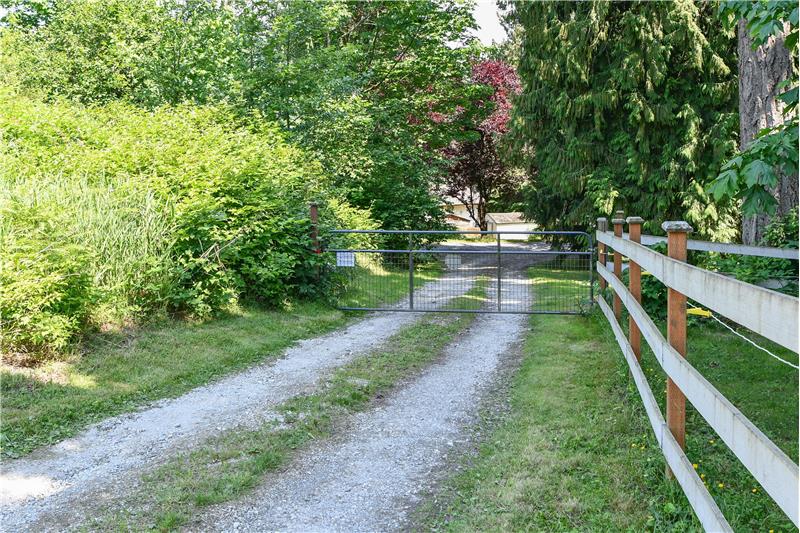 Gate going out of property