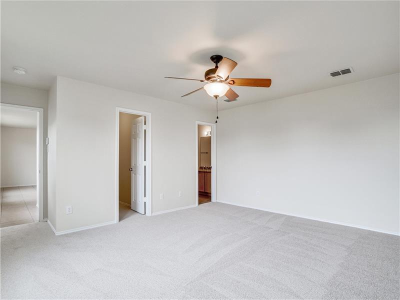 Private master suite with walk in closet
