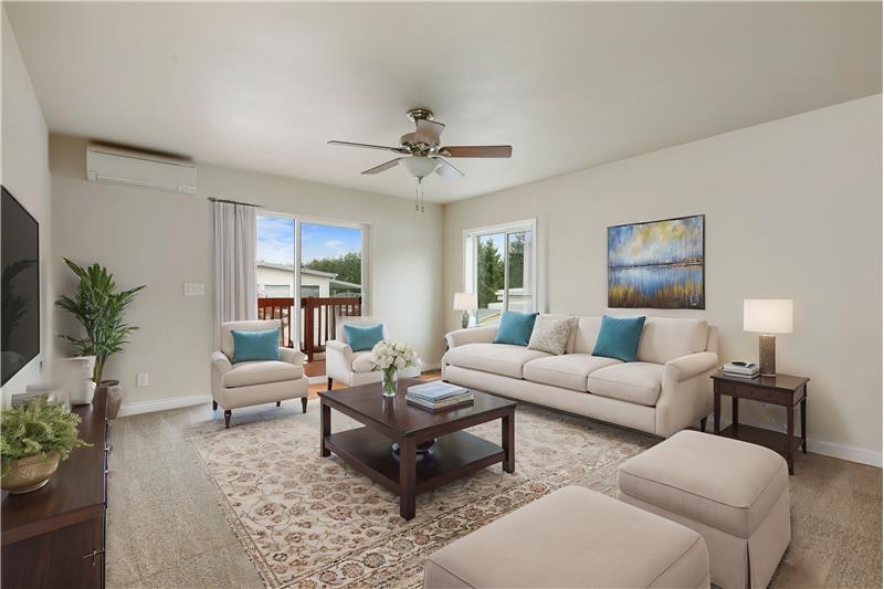 Light-filled living room and deck.