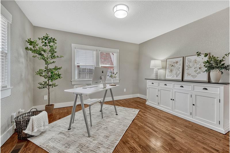 Main level bedroom or office with adjoining 3/4 bath
